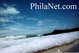 The Tide Rushes
in... and onto a Jersey Beach